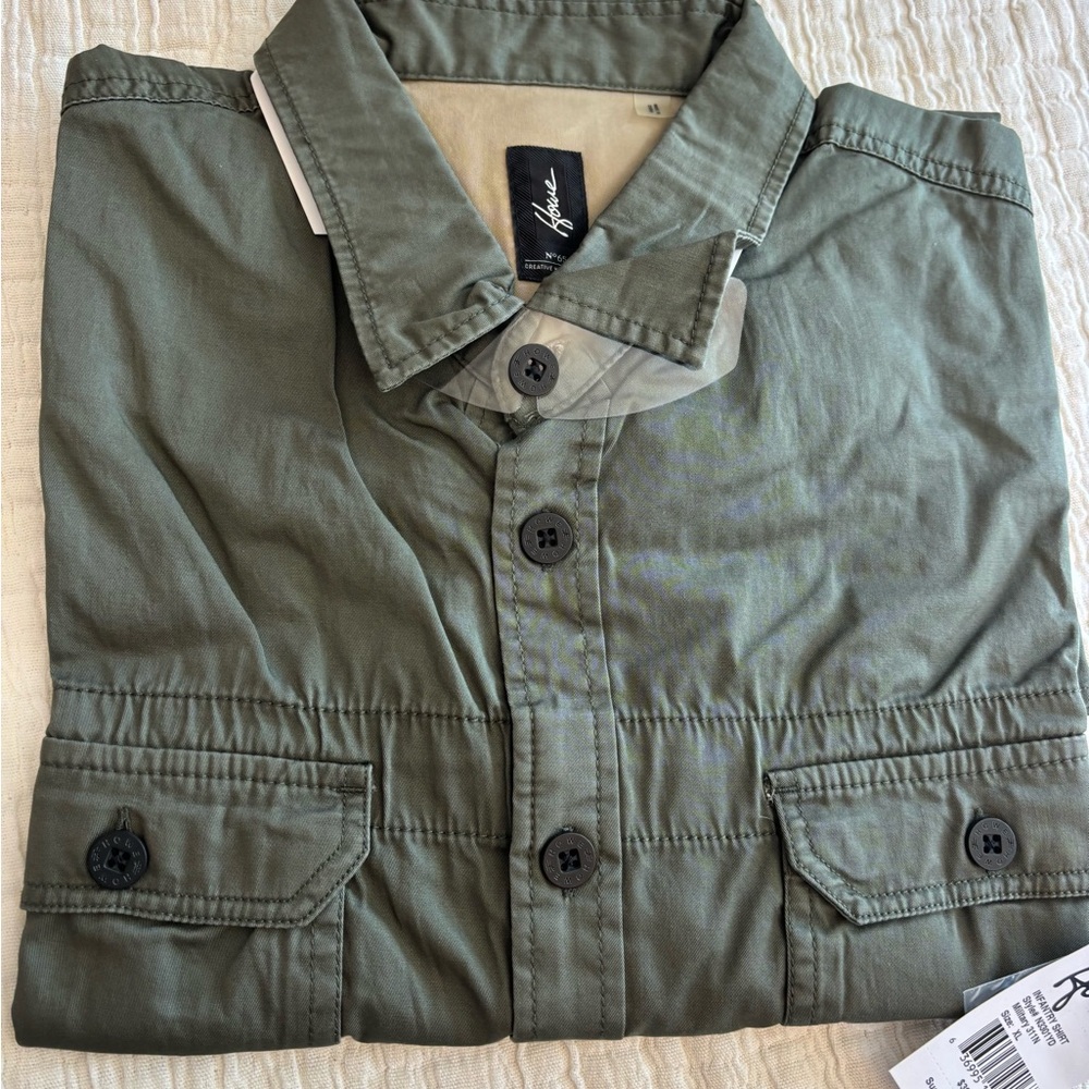 HOWE - New, in original bag/original tags! 
Military green. Timeless, well made!